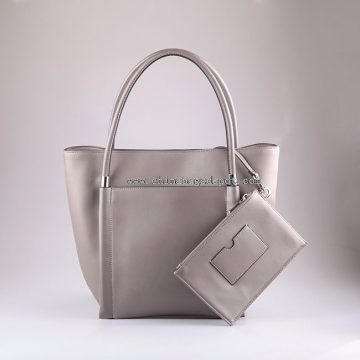 As mulheres sacolas de mão com bolsa pequena