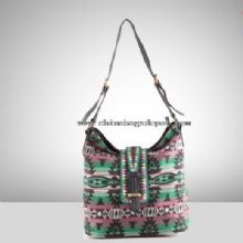 Flower-motived canvas handbags images