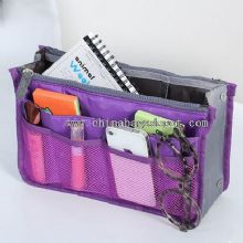 Travel toiletry bag with dual compartments images