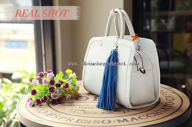 Fancy design bag with decorative tassel