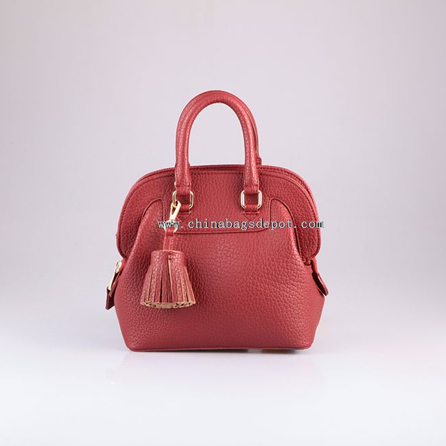 Leather tassel satchel style handbags