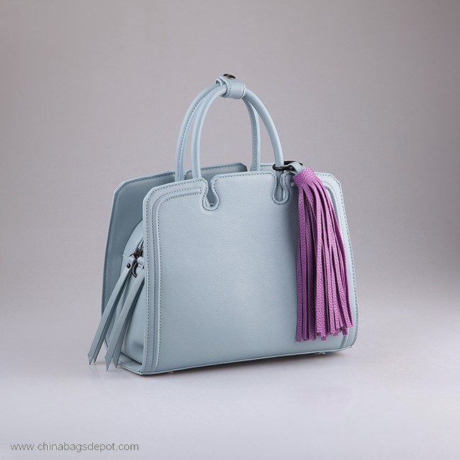 Fancy design bag with decorative tassel
