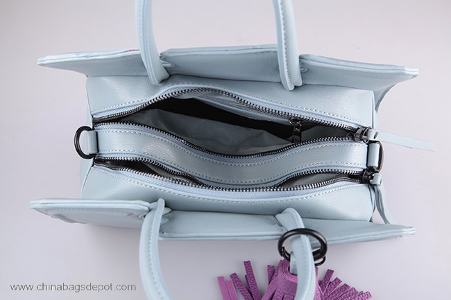 Fancy design bag with decorative tassel